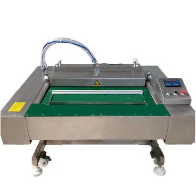 China Continuous Rolling Belt Packaging Machine dz 1000/1100 with Vacuum Packing 750 KG for sale