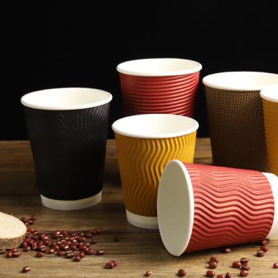 China Wholesale Disposable Ripple Wall Ripple Coffee Corrugated Paper Cup With Lids for sale