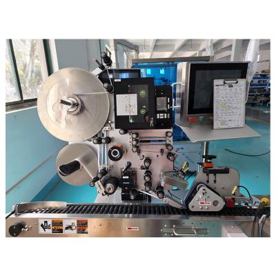 China Hot Selling CLOTHING Box Labeling Machine Round Labeling Machine Automatic Sticker Labeling Machine for sale