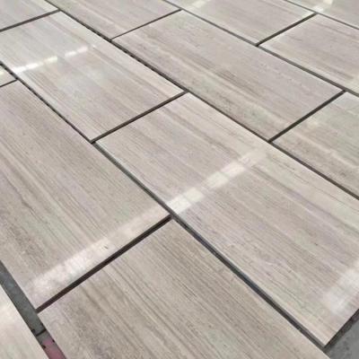 China Modern Natural White Wood Veins Marble Slabs And Tiles For Flooring for sale