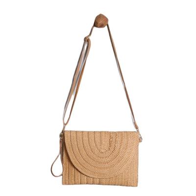 China Fasion Manufacturers wholesale 2021 new straw woven bag shoulder diagonal envelope bag flip bag beach for sale