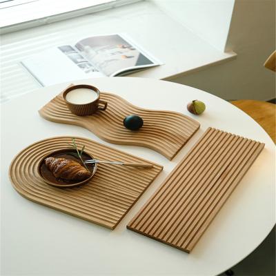 China Hot Seller Eco-Friendly Latest Design Amazon Exotic Shaped Wooden Stock Beech Bread Trays for sale