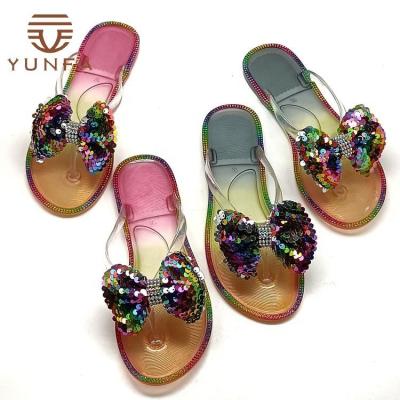 China Trend Jelly Flip Flops Sandals Fashion Outdoor Shoes Jewelery Bow Flat Ladies Slides Slippers Shoes For Girls for sale