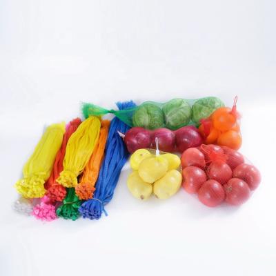 China Food Supermarket Use Small Mesh Net Pocket Bag Packing Colorful Woven Ginger Garlic Onion for sale