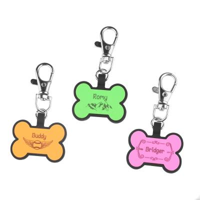 China Fashionalbe Bone Shape Silicone Dog Tag Anti Lost ID Tag for sale