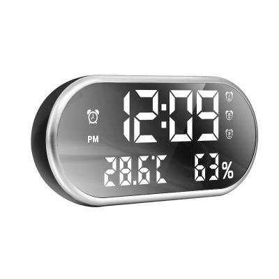 China Files Modern Design Oval Mirror Face Digital LED Desktop USB Alarm Clock with Thermometer and Hygrometer for sale