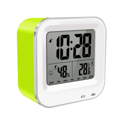 China Rechargeable Calendars LCD Humidity Display Nap Function Table Kids Digital Alarm Clock for sale