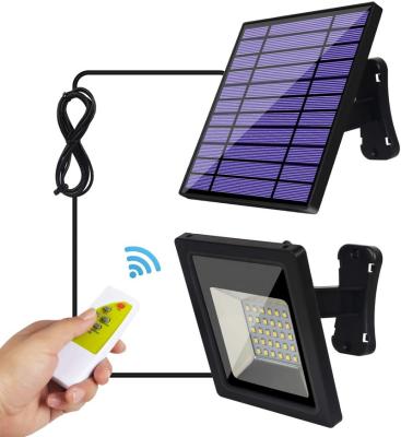 China Adjustable Remote Solar Outdoor Flood Light Solar Panel Controller Home Security Sports Stadiums Pendant Light Gazebo Indoor Porch Shed Kits for sale