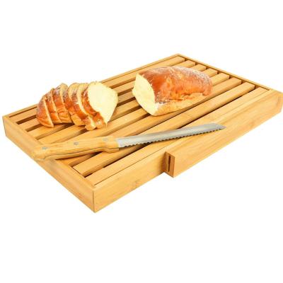 China Sustainable Bamboo Bread Slicer Cutting Board with Bread Crumb Tray for Homemade Bread, Bread Cake and Bagel for sale