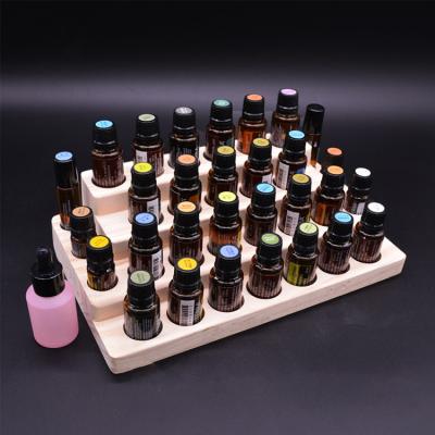 China Wooden Acrylic Essential Oil Display Stand Counter Holder For Sale 29*16.5*8cm for sale