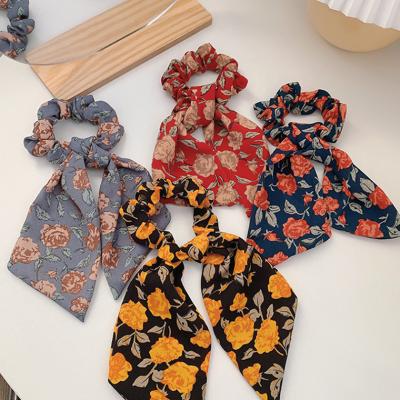 China Fashion Sweet Ladies Bows Ribbon Elastic Floral Printed Hair Bands Elastic Large Intestine Hair Bands for sale