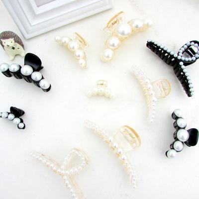 China Environmentally friendly new arrival big hair claw cuts clear claw Korean women's hair pearl pearl hair claw for sale