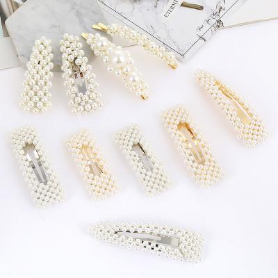 China Sweet Korean Style Pearl Hair Clips Designer Pearl Hair Clips Accessories Shape Pearl Bangs Side Clip for sale