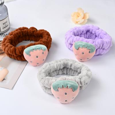 China Fashion Durable High Quality Strawberry Decorate Hair Band Women Make Up Face Wash Solid Color Flannel Headband for sale