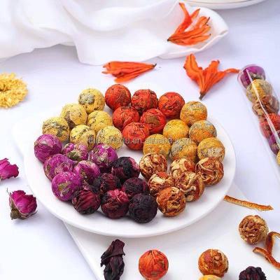 China Natural Chinese Handmade Detox Flowers Opener Wholesale 11 Handmade Black Flower Flavors Flowering Tea Ball Glass Tube Available for sale