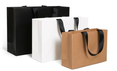 China Hand made Easy Fold-up Recyclable Kraft Paper Shopping Bags with Wide Thread Rope in Customized Size for sale