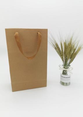 China Machine made bottom Vertical version Kraft Paper Shopping Bags with Wide Thread Rope in Customized Size for sale