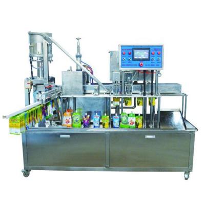 China Automatic 2 Food Spouts Fruit Juice Stand Up Pouch With Cap Beverage Drink Filling Packing Machine for sale