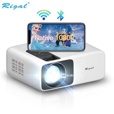 China OEM 1080p 4K Digital Integrated Projector Rigal New Design Internet Video Portable Home Theater Projector for sale