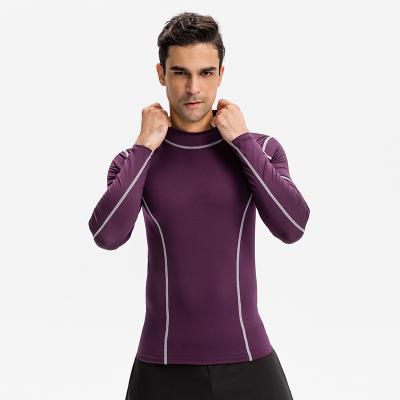 China Breathable High Elastic Long Sleeved High Constricted Color Matching Fitness Sleeve Crac! crack! long top sports men sports for sale