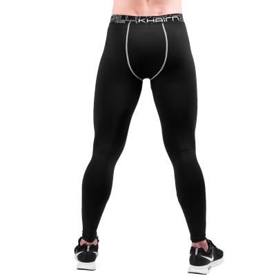 China Hot Sale Sweat-absorbent Breathable Fashion Wicking Away Warm Fitness Casual Running Tights Hip Length Sports Pants For Men for sale