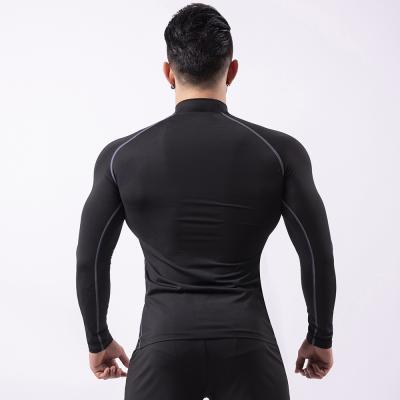 China Breathable Black Quick-Drying T-shirt Tights Shaping Gym Running Sportswear Sportswear Long Sleeve Tops for sale