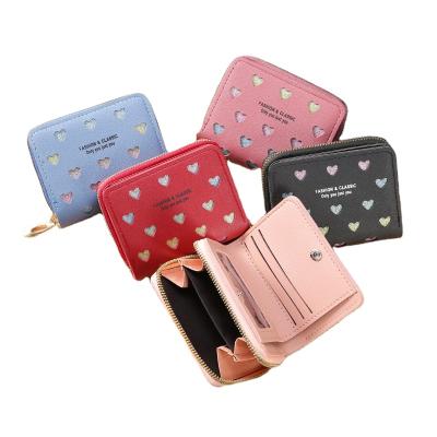 China RFID WAKED Hollow Wholesale Heart Bifold PU Cute Short Coin Purse Wallet For Women for sale