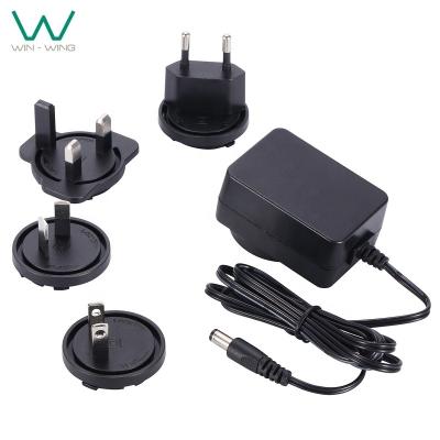 China PC and ABS Interchangeable AC DC Adapter 5V 2A AUS EU UK Plug Plug Power Adapter for sale