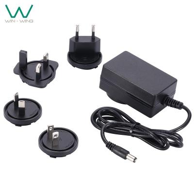 China Interchangeable DC AC Adapter 12V 2A 24V 1A Plug Power Adapter UL62368 TUV-GS CE PSE Certified WW1202000I for sale