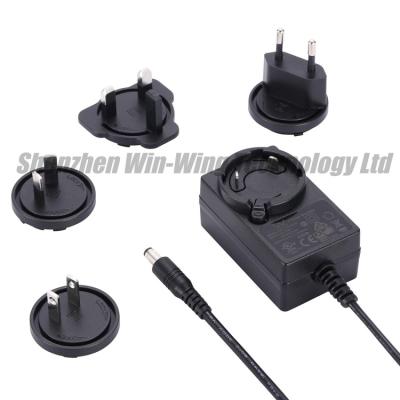 China ABS and PC AC DC Power Supply 12v 5a International Power Adapter with UK Aus Eu US Interchangeable Plug for sale