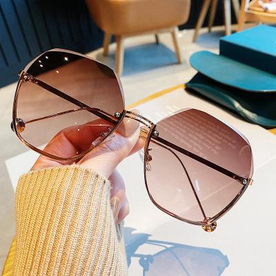 China Fashion Sunglasses 2021 New Rimless Women Metal Square Sun Glasses Shades Sunglasses Shape Big Frame Sunglasses for sale