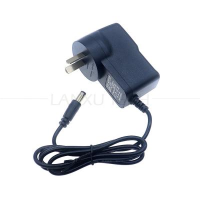 China Alta Qualidade Au Eu Us Uk Plug 220-240v Ac para 12v 9v 5v Dc 5.5x2.1mm 2.5mm Jack Adaptador de Energia para Modem Monitor Router à venda