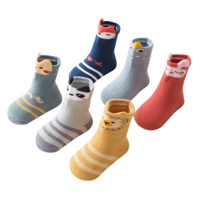 China Thickness QUICK DRY high quality kids winter warm cotton thongs anti slip medium tube indoor floor socks for sale