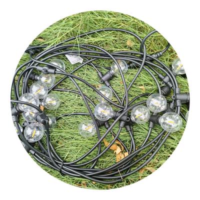 China Top Selling G40 String Lights G40 Vintage Edison Light Bulb Fairy Clear Filament Indoor Outdoor Connectable Waterproof Wedding Lights Scallop String for sale