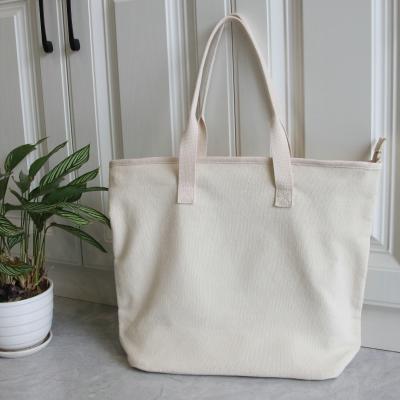 China Customized White Canvas Handled Casual Plain Nature Zipper Closure Cotton Shopping Tote Bag for sale