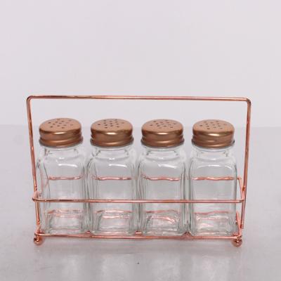 China Minimalist clear glass spices jar with metal holder with metal lid for sale