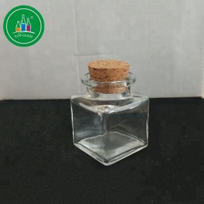 China Freshness Preservation 50ml Square Jar Glass Jar With Cork for sale