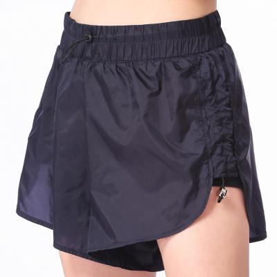 China Sports Breathable Loose Quick Drying Shorts For Women Elastic String Fitness Yoga Shorts With Safety Shorts for sale