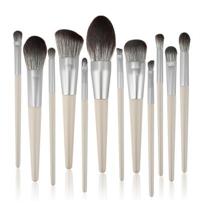 China Angular Blush Makeup Brush Wholesale 12pcs Tapered Wood Handle Makeup Brush Set for sale