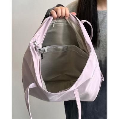 China 2023 Hot Selling Span Women's Fashion Handbag Nylon Fabric Shoulder Bag Oblique Cream Purple Large Capacity Nylon for sale