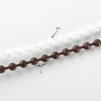 China Durable Roller Blinds Curtain Components 4.5*6mm Thick Plastic Chain Pom Pom Plastic Rope Ball Shade Roller Shade Chain for sale