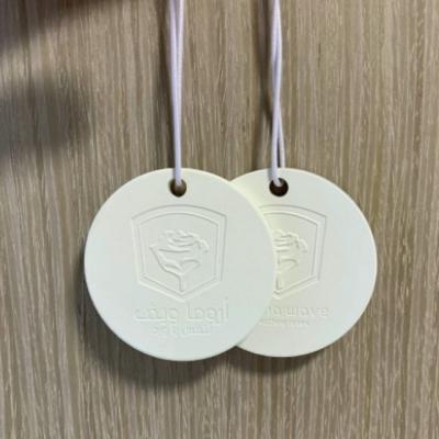 China Home Aroma Stone Ceramic Disc Customized Logo Perfume Ornament For Home Decoration for sale