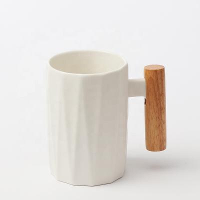 China Viable Wholesale Porcelain Black Coffee Mugs With Logo Wooden Handle Cups And Mugs Coffee Mug for sale