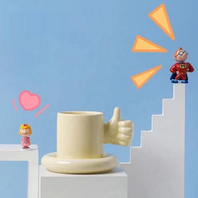 China Viable Unique Creative Christmas Large Gesture Christmas Ceramic Coffee Mug And Cup With Saucer For Kids for sale