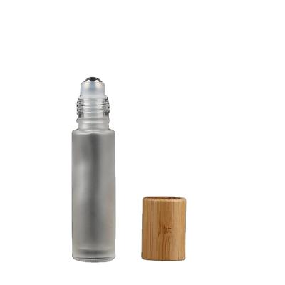 China Inner Bottle 5ml Bamboo White Bamboo Lid Personal Care Essential Oil Roller Glass Bottle for sale