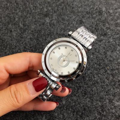 China Perpetual Calendar Wholesale Exquisite Quartz Watches Rotatable Watches for Women for sale