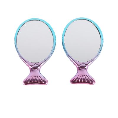 China 2021 Minimalist Customized Multifunctional Colorful Fish Shaped Mirror Makeup Mirror For Girls for sale