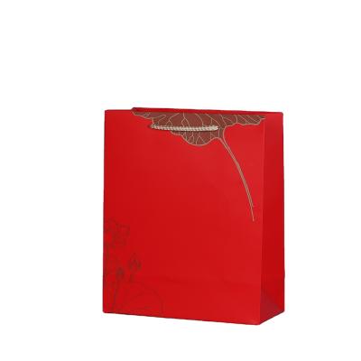 China Recycled Materials White Paper Bags With Twisted Handles Supplier Gift Shopping Bags for sale