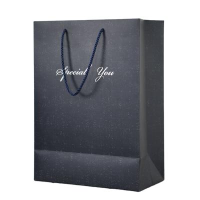 China Recycled Recyclable Materials Kraft Paper Bag With Your Own Logo Custom Shopping Paper Bag For Clothes With Handle for sale