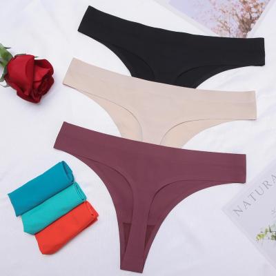 China Anti-Bacterial Various Solid Colors Seamless Traceless No Show Elastic Waist Panties Underwear Women Sexy G-String Seamless Thong for Lady for sale